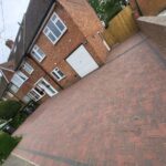 A new driveway that has been installed using paving stones.