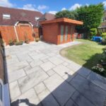 A landscaped garden that has a new patio and garden room installed.